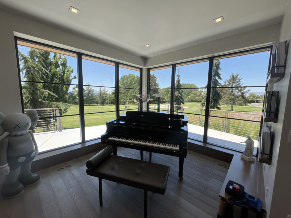 Residential window tint installation in Utah home to reduce heat, glare, and UV damage