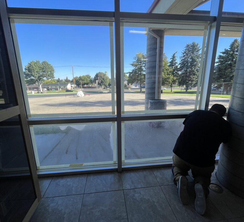 Security window film installed to prevent forced entry